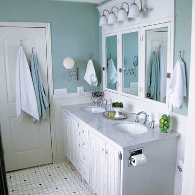 Ocean-inspired bathroom with seafoam green walls.