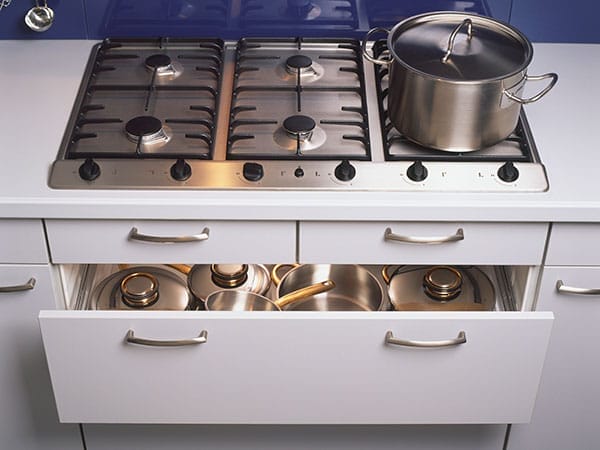 Pots and pans in a storage drawer