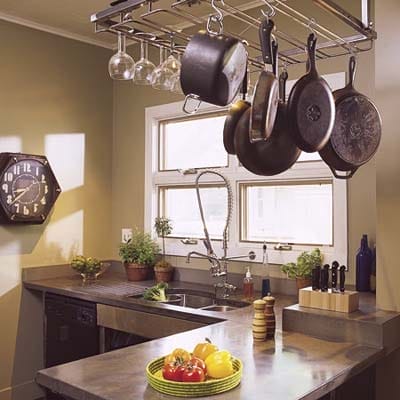 Kitchen with olive-colored walls.