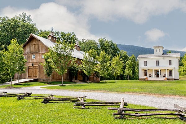 Peacock Hall Italianate farmhouse and 1871 Amish Celebration Barn at Cloudland Station.