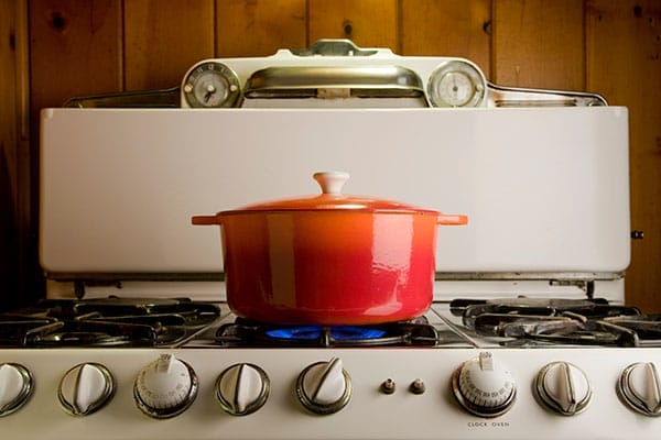 A pot on a lit stove