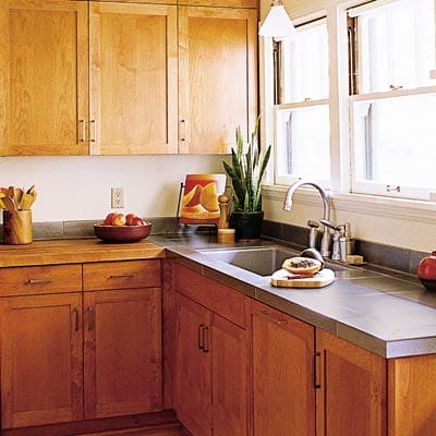 Natural solid-wood kitchen cabinets.