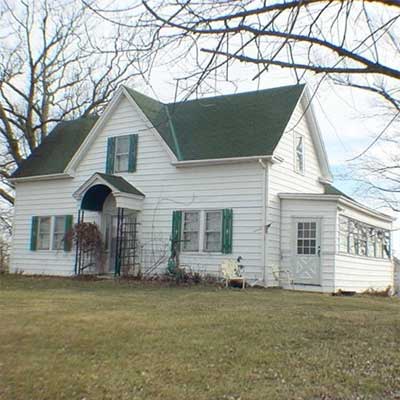 An 1884 house with a green roof