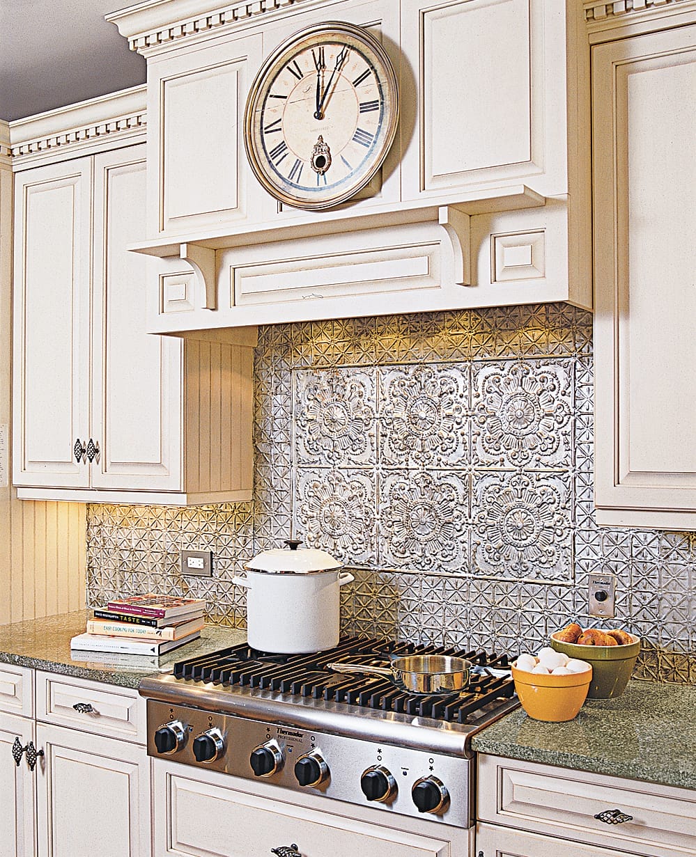 Image of a kitchen backsplash made of metal tiles