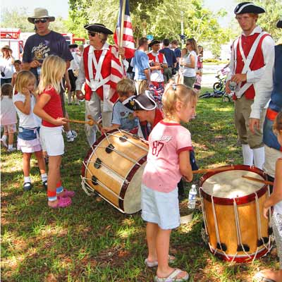 Children enjoying a historical demonstration