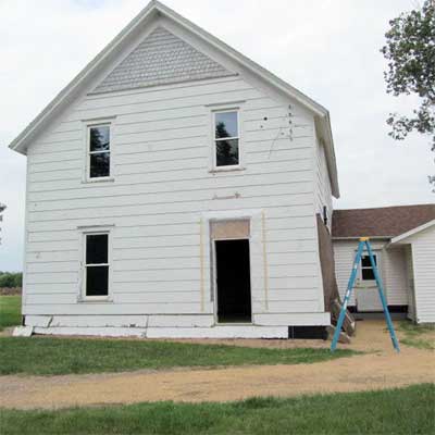 A two-story white house