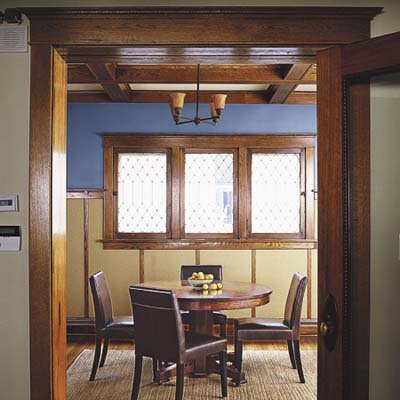The dining room with wooden trim