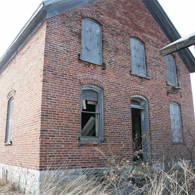 A vacant brick house
