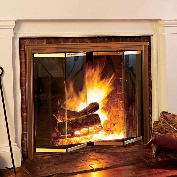 A set of chainsaw cut wood in a fireplace.