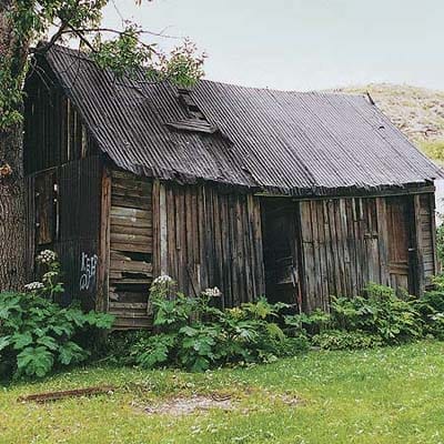 A crumbling shed
