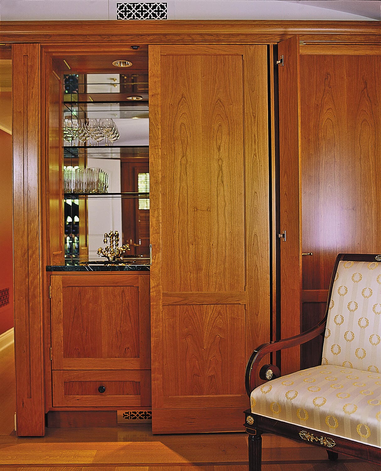 A bar cabinet for storing glasses.