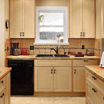 A view of the kitchen sink and dishwasher