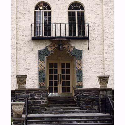 Image of an entryway with Mediterranean surround style