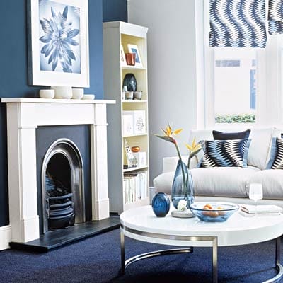 Bold blue painted living room walls.