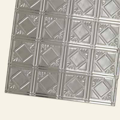 Stainless steel ceiling panel showing geometric pattern.