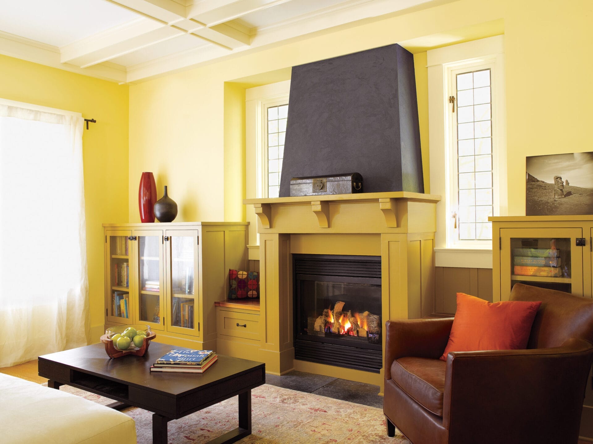 Gas fireplace with Craftsman mantel as architectural focal point in Seattle living room.