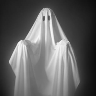 A man dressed as a ghost.