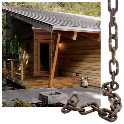 Rain chain hanging from the gutter of a home.