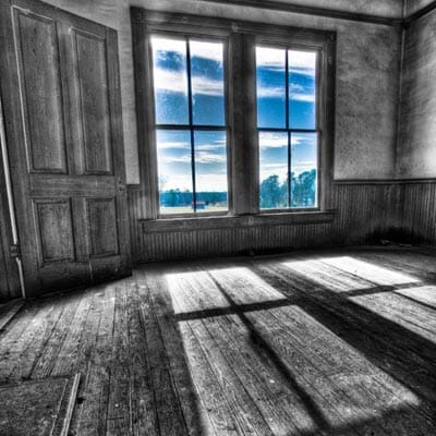 A haunted home with creepy grey lighting 