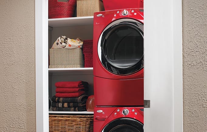 Red stacked front-loading washer and dryer.