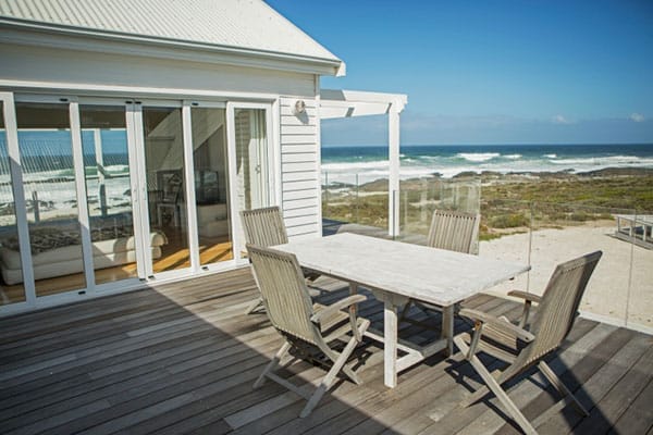 a beach house deck with a natural feel