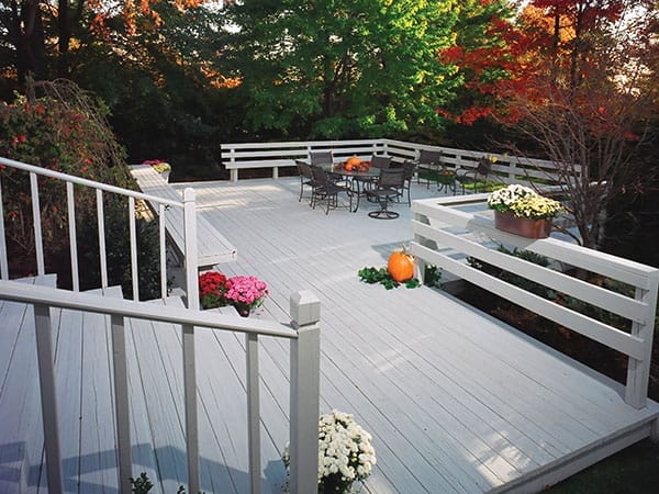 a gray deck that stands out from its surroundings
