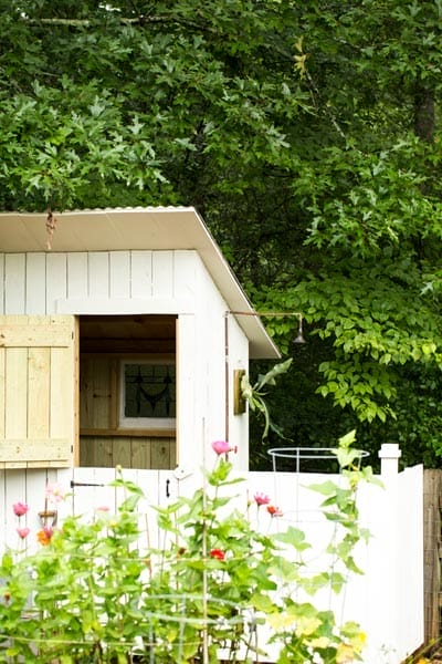 A white garden shed