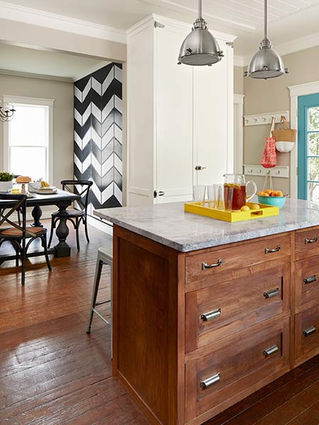 Kitchen island and view of dining room.