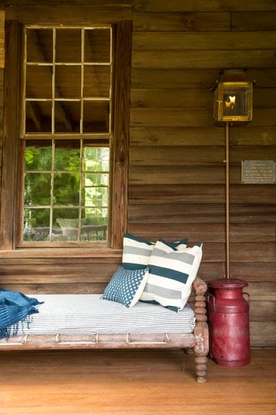 A restored porch with a lounging area