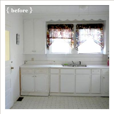 Drab all-white kitchen before renovation showing dated cabinets and counters.