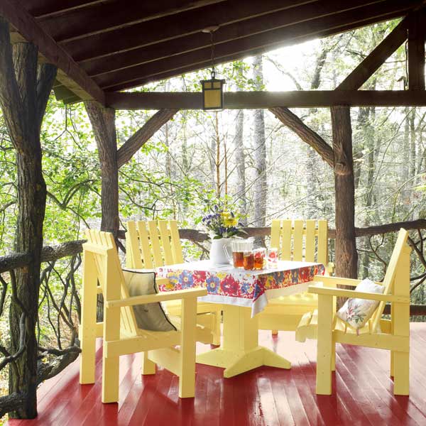 An outdoor porch with colorful furniture