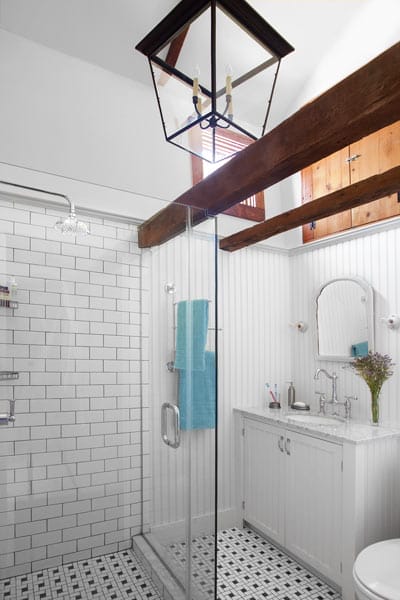 The master bathroom with exposed beams