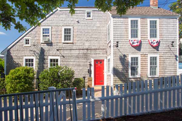 A large house with a red front door