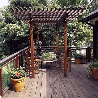a pergola added to a deck