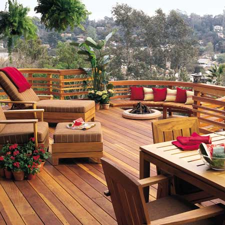 a designer deck with furniture and a beautiful view