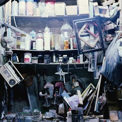 A dirty and messy home storage area.