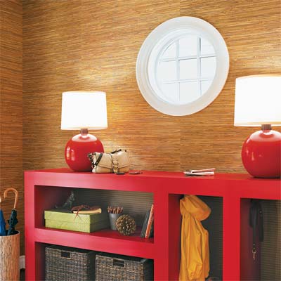 A console table covered with red laminate.