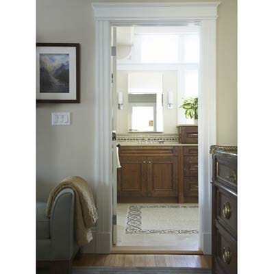 Master bathroom entrance through doorway from bedroom.