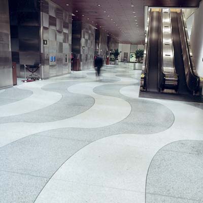 Photo of terrazzo flooring within a shopping mall. 