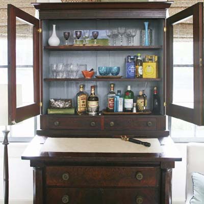 A cabinet with blue inside walls