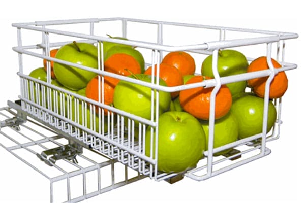 Sliding white wire basket filled with fruit.