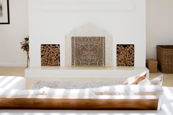 Cover Fireplace With an Ornate Fire Screen