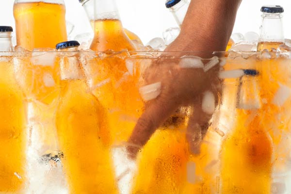 a bucket of drinks with ice made from gutters