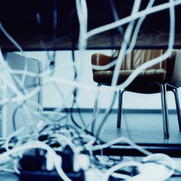a bundle of electrical cords that are disorganized