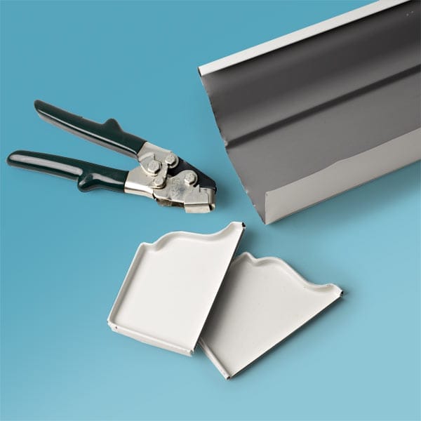 A gutter and a hand tool