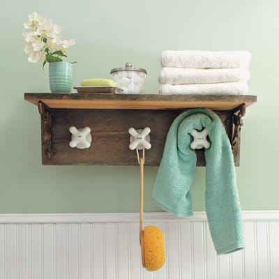 A bathroom upgraded with a vintage towel rack.