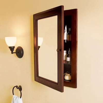 A bathroom upgraded with medicine cabinet.