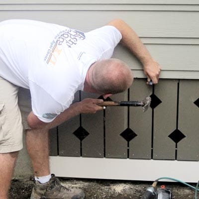 Attaching custom porch details.