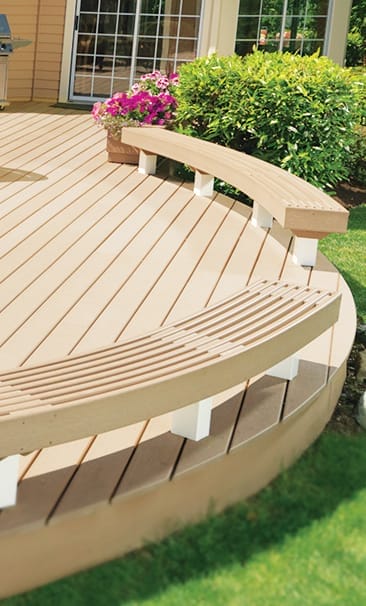 Deck with rounded edges and built-in benches.