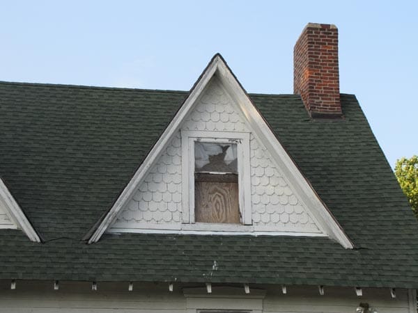 Gable windows boarded up
